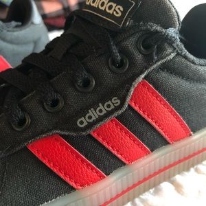 Adidas Boys skate-style sneakers, vintage black and red.